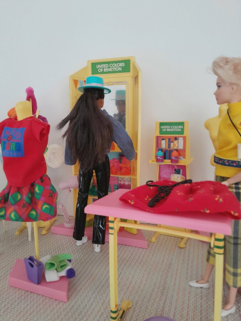 Patrizia tries on a hat